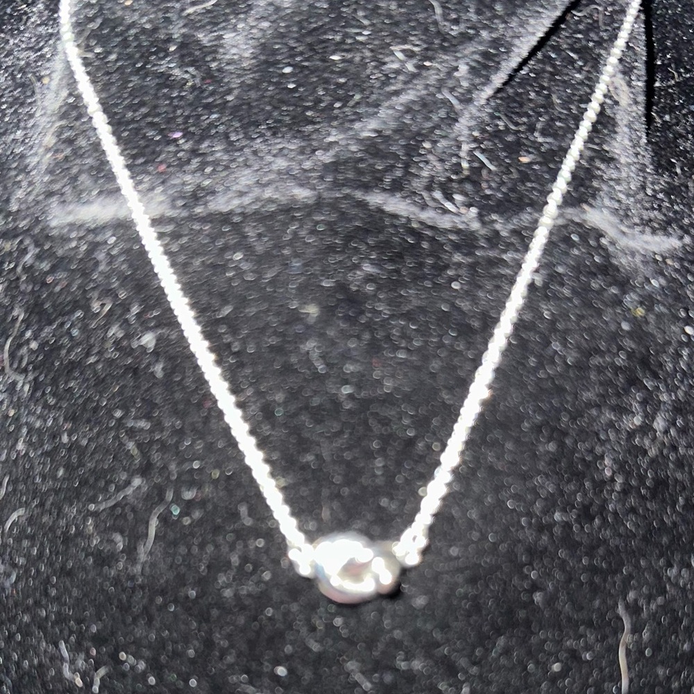 Kate Spade silver tone twisted knot heart necklace - Picture 2 of 5